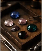 Colored stones arranged on a tray